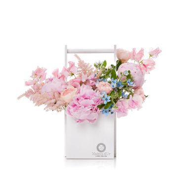 Box with pink lilies and white roses