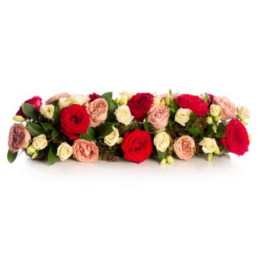Floral arrangement of roses and lisianthus