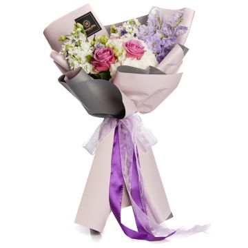 Bouquet of flowers with white hydrangeas and lilac roses