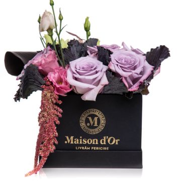 Box with lilac roses and pink lisianthus