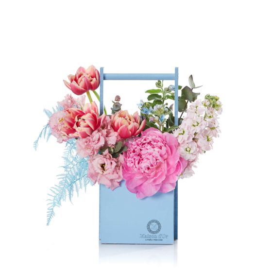 Box with red roses and alstroemeria