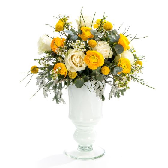 Wedding floral arrangement of roses, ranunculus