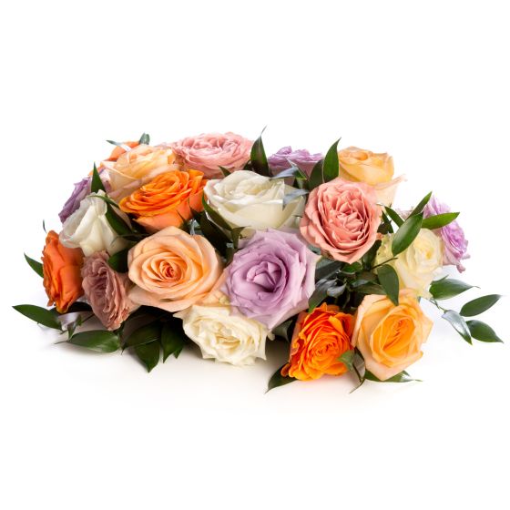 Floral arrangement of peach, purple, orange, white, cappuccino roses