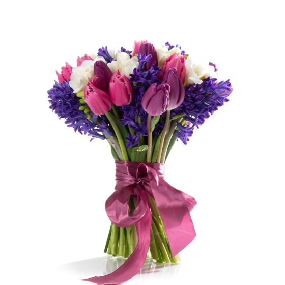 Bouquet with hyacinths, freesias and multicolored tulips