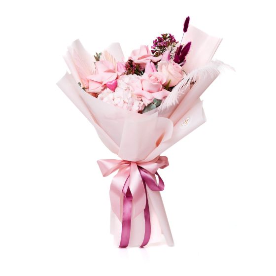 Bouquet of white freesias and pink roses