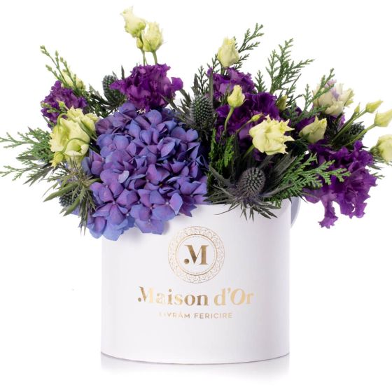 Box with purple hydrangea and purple lisiantuhs
