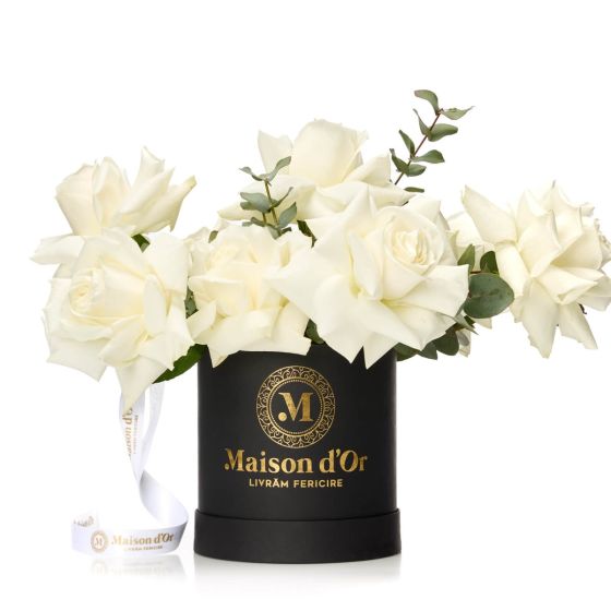 Box with 9 white roses and eucalyptus