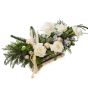 Christmas arrangement with white roses