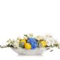 Floral arrangement with hydrangea, white roses and lemons
