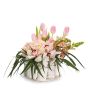 Floral arrangement in basket with tulips