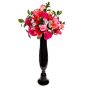 Wedding floral arrangement of lilies, roses