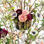 Wedding floral arrangement from anemones, roses