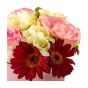 Floral arrangement of freesias and pink roses