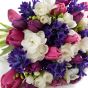 Bouquet with hyacinths, freesias and multicolored tulips