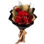 Bouquet of flowers with amaryllis and red roses