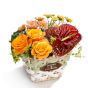 Floral arrangement in basket from roses, anthurium