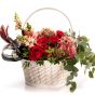 Floral arrangement in basket with hydrangea and Antirrhinum