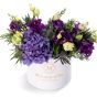 Box with purple hydrangea and purple lisiantuhs