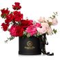 Box with 21 multicolored roses