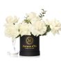 Box with 9 white roses and eucalyptus