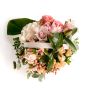 Floral arrangement in basket with white germs and mini rose